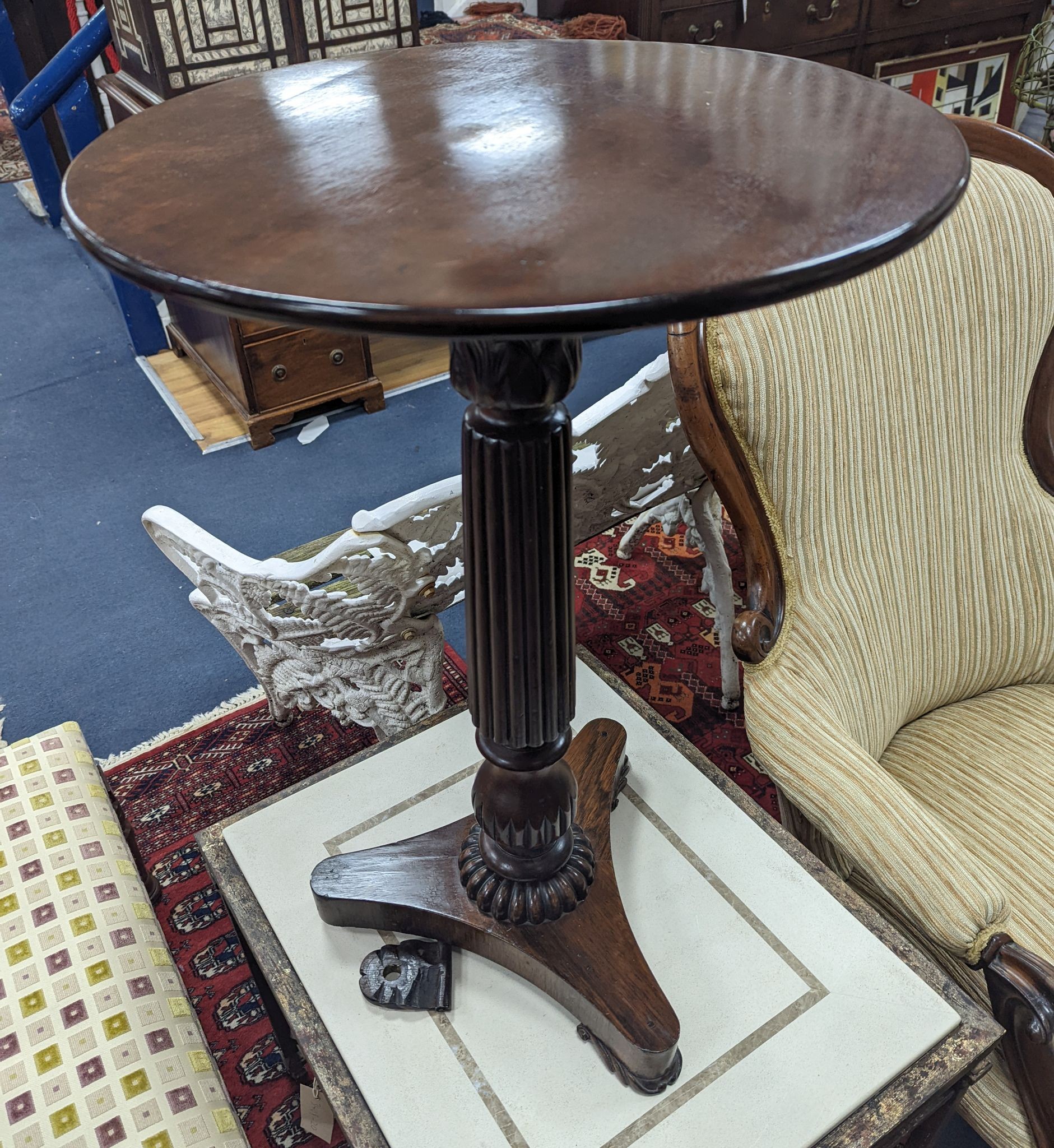 A Regency and later circular mahogany and rosewood wine table, diameter 45cm, height 69cm